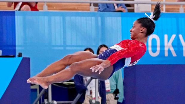 simone-biles-twisties-vault-mid-air